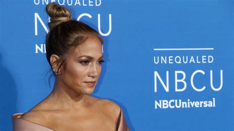 jennifer lopez celebrates birthday with a rod in sexy see through dress
