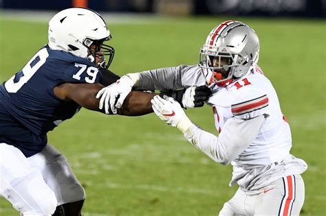 ohio state football defensive ends balancing veteran poise  young