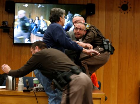 victims father lunges at larry nassar in michigan