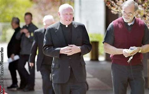father felix cassidy of st jude shrine in san francisco center and father xavier lauagetto