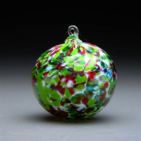 Hand Made Blown Glass Christmas Ornament In Tones Of Red