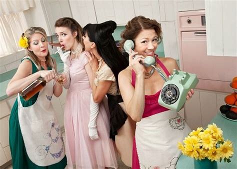 Three Women In Dresses Are Talking On The Phone