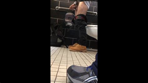 caught a guy jacking off in the next bathroom stall male voyeur porn at thisvid tube