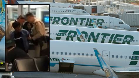 woman kicked off frontier flight after vomit complaint sues for 55m