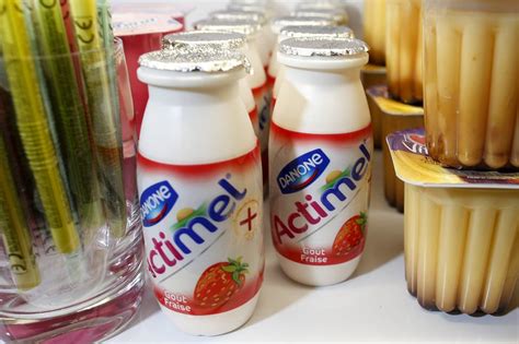 danone boosted  improved profit outlook wsj