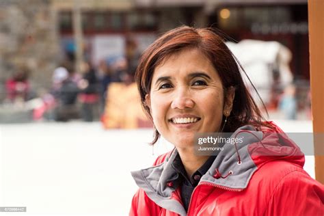 femme mature asiatique souriante photo getty images