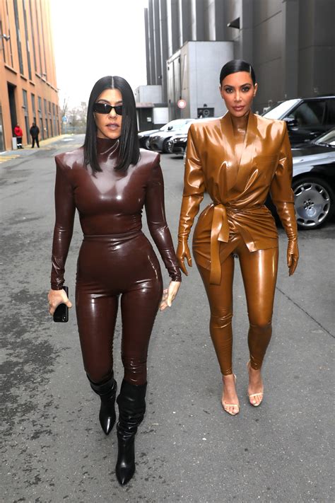 kourtney and kim kardashian twin in matching latex outfits during paris
