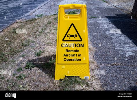 frame style drone warning sign reading caution remote aircraft  operation stock photo alamy
