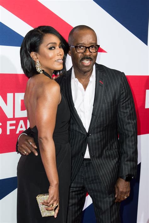 angela struck a pose with her man at the premiere of