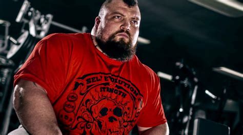 Eddie Hall Bench Presses Two Grown Men For Reps