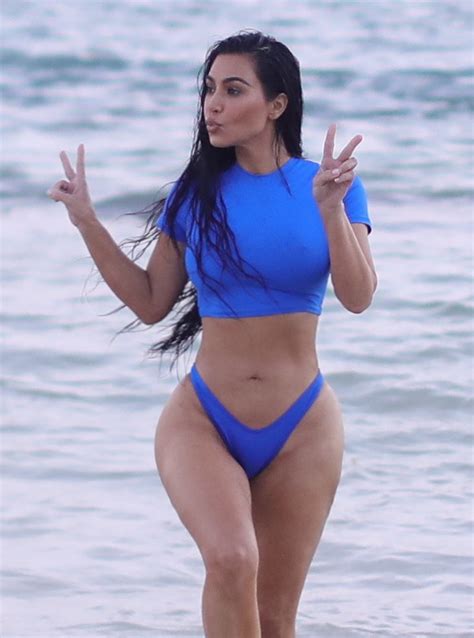 kim kardashian shows off killer curves in blue bikini on the beach