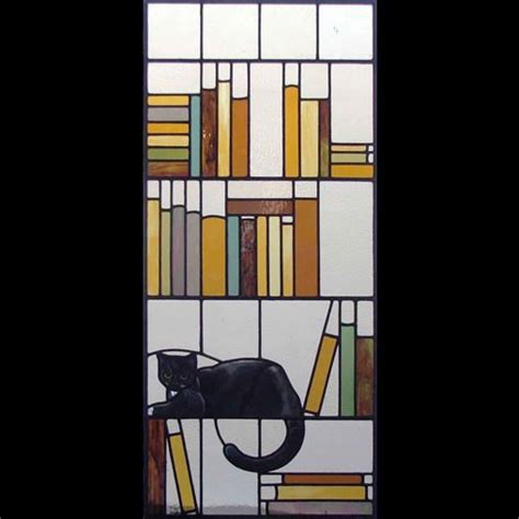 stained glass panel with cat and bookshelf by bridport stained glass