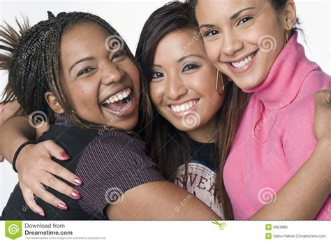 portrait of three teenage mixed race girls stock image