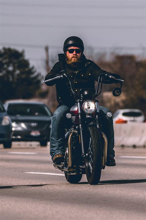 man riding motorcycle  highway  stock photo
