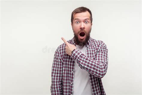 wow   portrait  shocked bearded man pointing finger