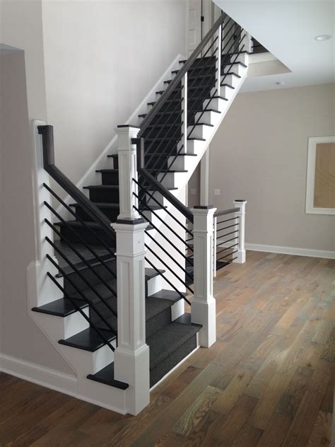 black stairs covered   charcoal grey runner stair railing
