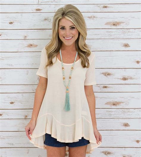 our fuzzy naval top is so cute paired with denim shorts