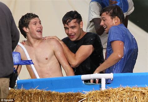 one direction get wet and wild on the set of their brand new music