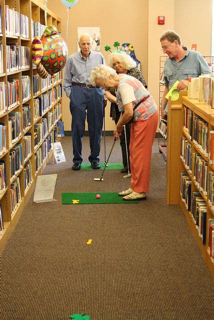 foursome teeing off at hole 1 library ideas programming and middle school libraries