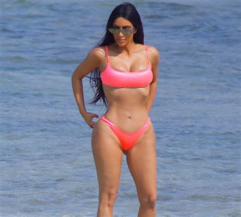 Kim Kardashian Risks Losing Her Diamond Earrings Again As She Leaps