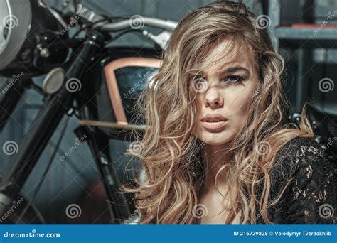 Sensual Woman Girl Face Sitting Near Motorcycle On Garage Background