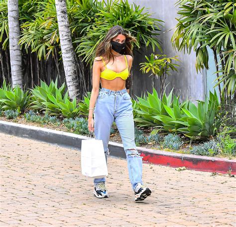 Madison Beer In A Surgical Mask And Yellow Bikini Top As She Grabs