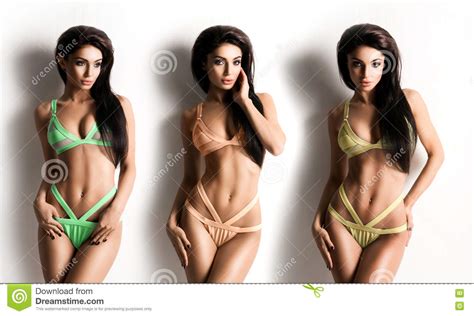 set of beautiful brunette girls posing in swimsuits stock