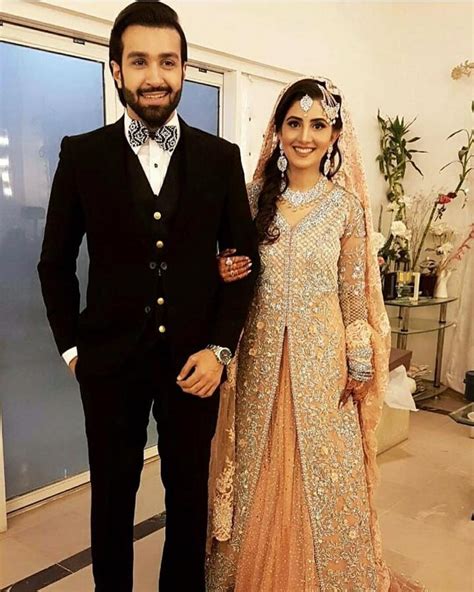 azfar rehman with his wife on their valima reception