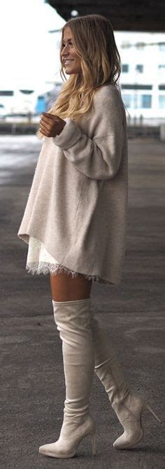 street style neutral sweater dress over lace dress and