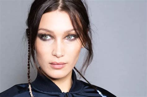 bella hadid paired the tiniest black string bikini with the biggest