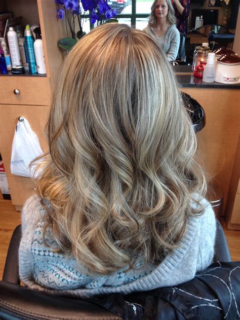 blonde highlights and lowlights curls hair by melissa