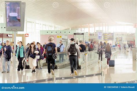 people walking   international departures corridor  el prat airport  barcelona