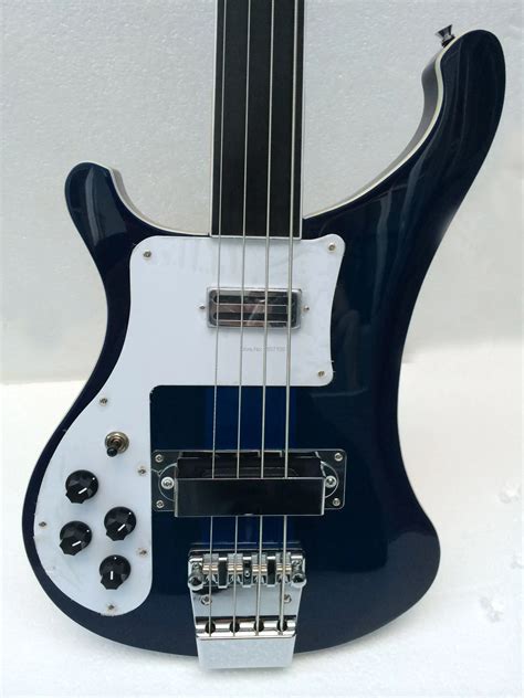 left handed fretless  bass guitar  transparent blue colorthru maple neck construction