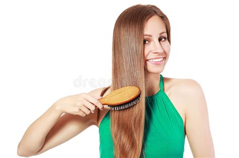 gorgeous lady brushing long hair isolated stock image