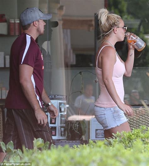 britney spears displays her muscular legs in tiny denim shorts on leisurely day out with