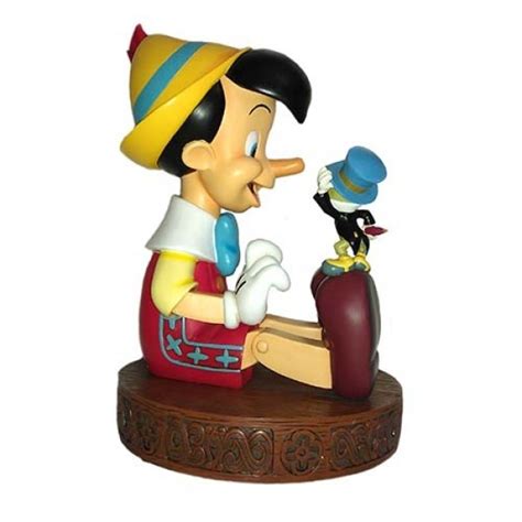 pinocchio and jiminy cricket figurine