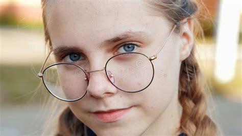 A Teenage Girl Wearing Glasses Close Up Of Her Face Stock Image