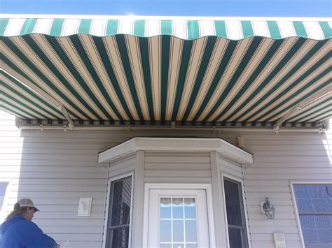 retractable awning  bay window awning retractable awning sunroom addition