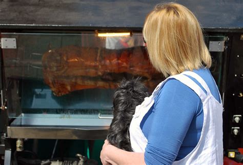 spit roast a woman droolingover a spit roast at the contin… flickr