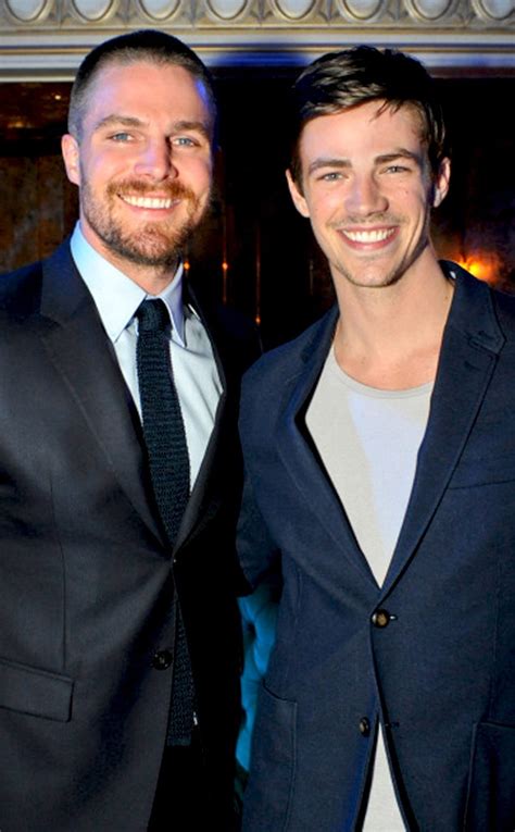 stephen amell and grant gustin from tv stars at the 2014 upfronts e news