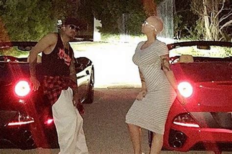 Nick Cannon And Amber Rose Have Matching Ferraris