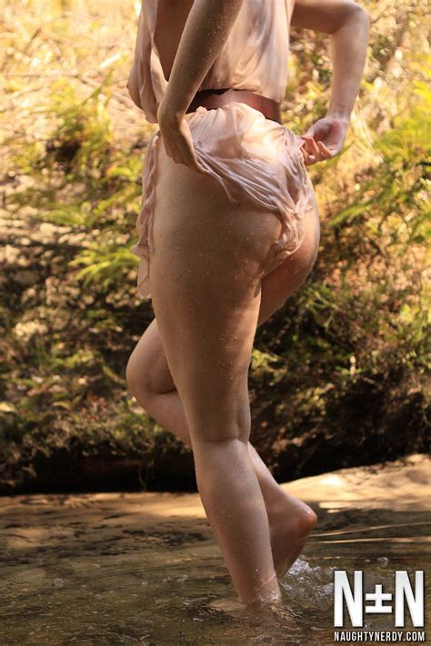Aeryn Walker Cools Off Her Hot Body In A Stream Photos