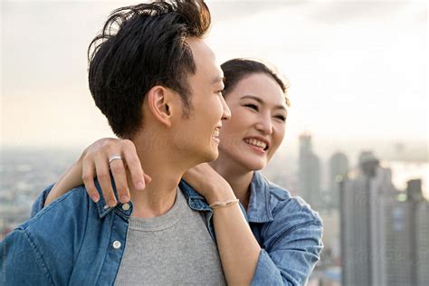 «portrait Of A Happy Asian Couple Laughing Del Colaborador De Stocksy