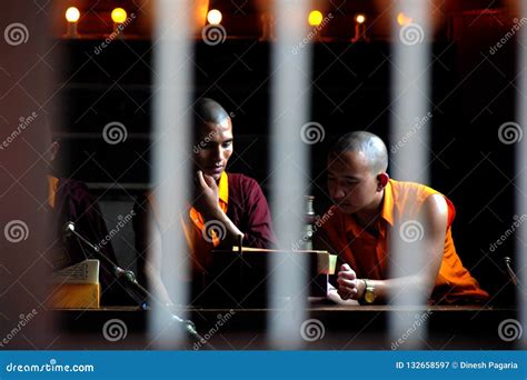 monks chanting prayers   monastry editorial photography image