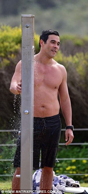 James Stewart Flexes And Shows Off Toned Body As He Cools Off In Palm