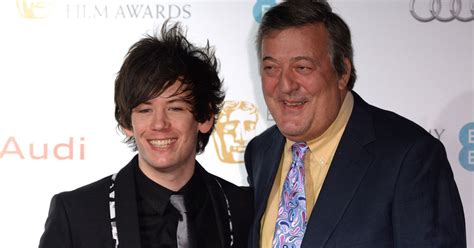 stephen fry s husband elliott spencer described with inverted commas by