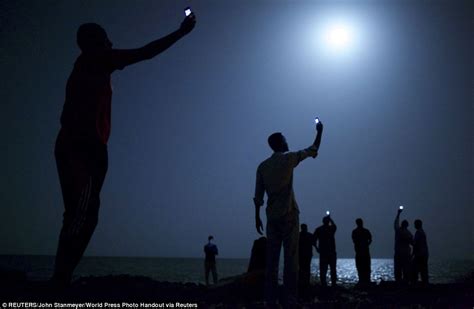 world press photo contest honours best images from around the globe daily mail online