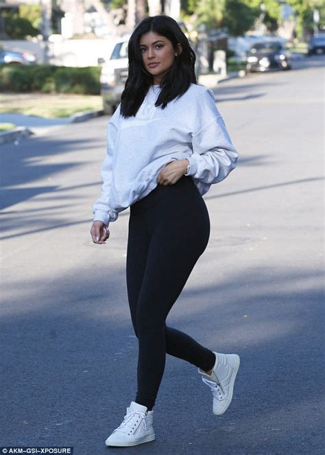 kylie jenner shows  curves  skintight black leggings      la daily mail