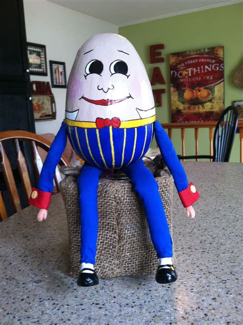 humpty dumpty  paper mache egg   painted   arms