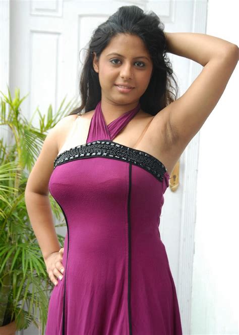 super actress sunakshi posing in sleeveless gown